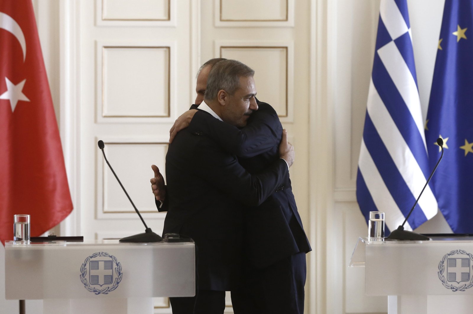 Greek Foreign Minister Giorgos Gerapetritis (R) embraces Foreign Minister Hakan Fidan (L) after their meeting, Athens, Greece, Nov. 8, 2024. (EPA Photo)