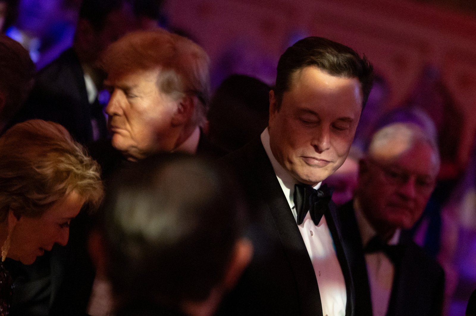 U.S. President-elect Donald Trump walks by Elon Musk during the America First Policy Institute (AFPI) gala at Mar-A-Lago in Palm Beach, Florida, U.S., Nov. 14, 2024. (Reuters Photo)