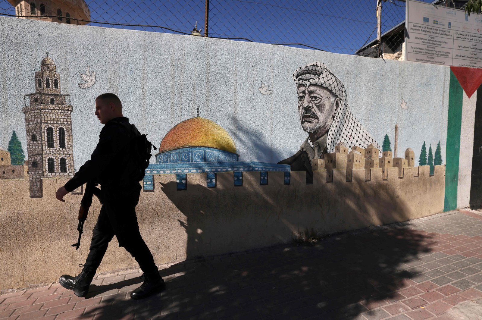 A Palestinian Authority policeman walks outside a police station, Hebron, West Bank, Palestine, Nov. 11, 2024. (AFP Photo)