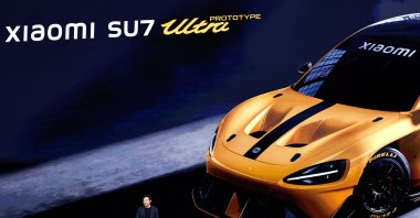 Xiaomi founder and CEO Lei Jun unveils Xiaomi's new EV sedan SU7 Ultra during an event, Beijing, China, Oct. 29, 2024. (Reuters Photo)