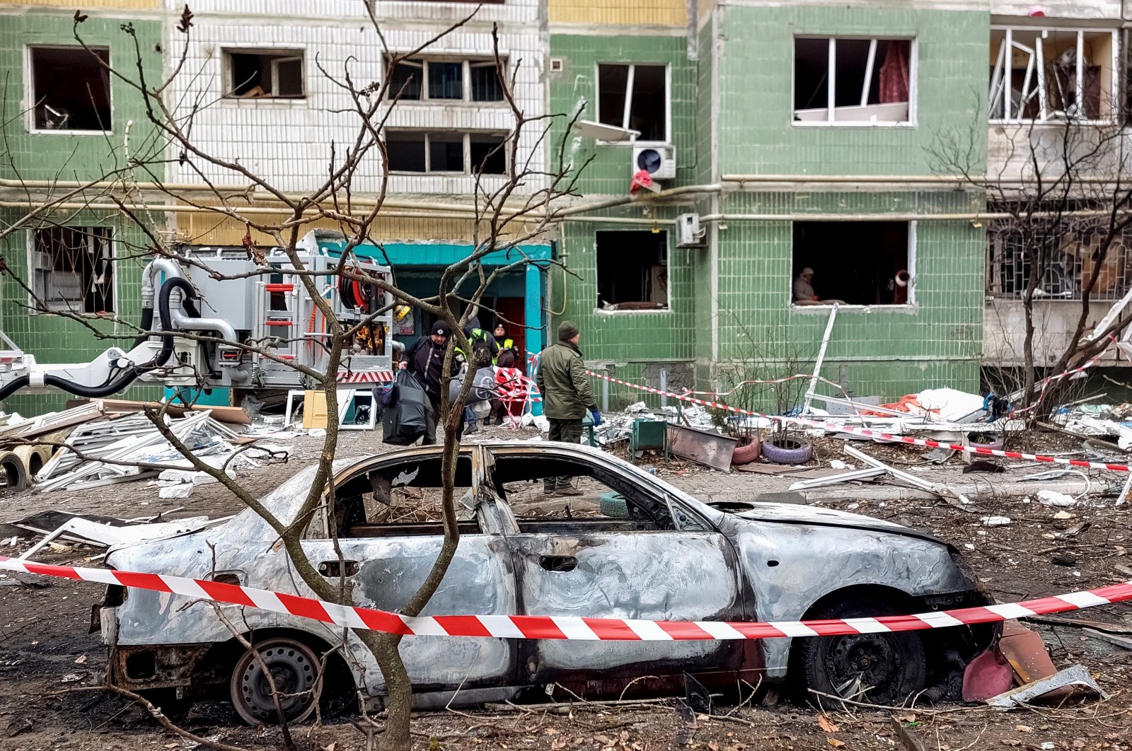 A view shows a destroyed car in front of a residential building, which was damaged by a Russian missile strike, amid Russia&#039;s attack on Ukraine, Sumy, Ukraine, Nov. 18, 2024. (Reuters Photo)