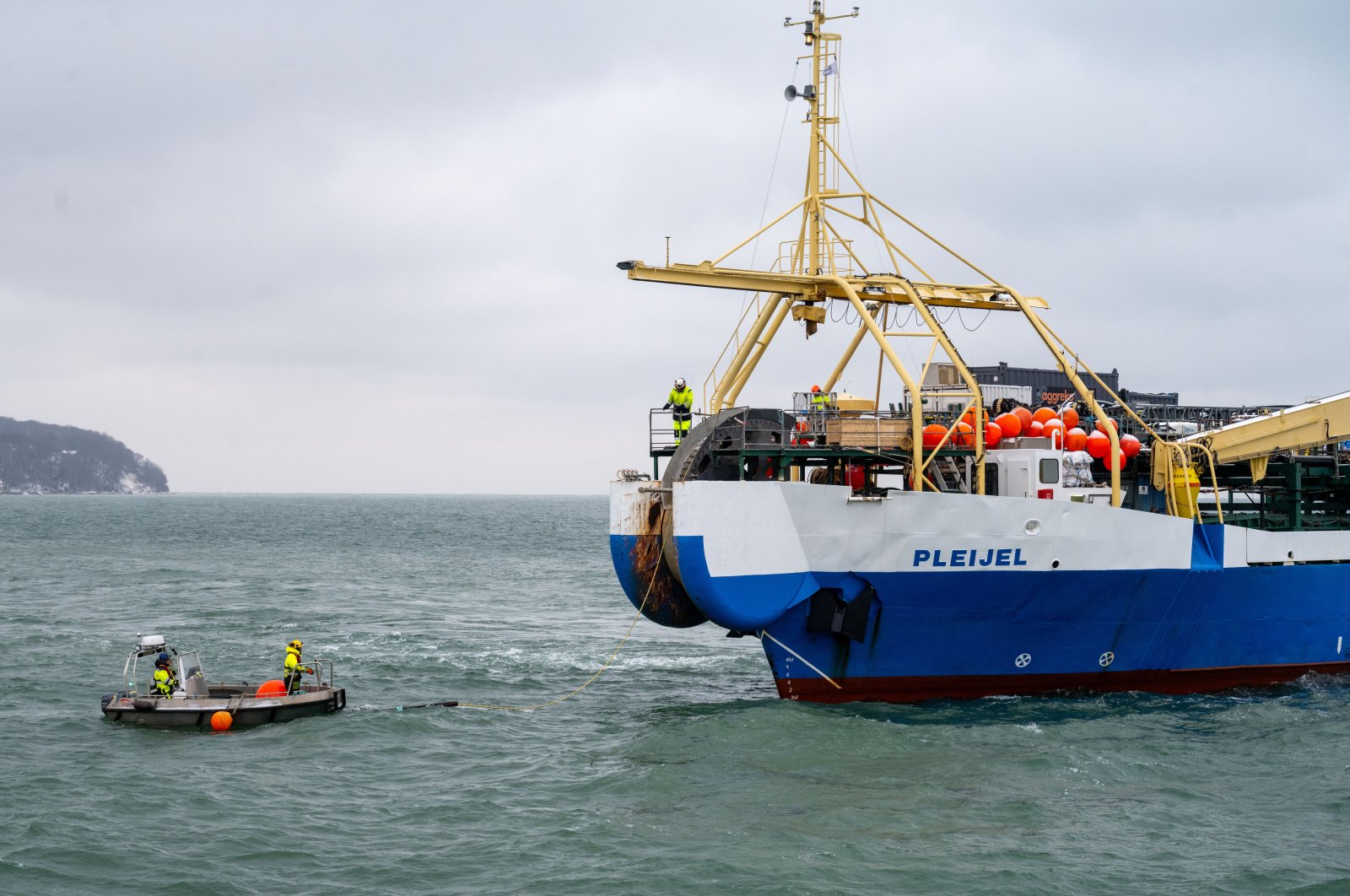 A fiber optic cable is pulled ashore from the cable-laying ship "Pleijel" at the entrance to the port of Sassnitz, Nov. 29, 2023. (Getty Images File Photo)