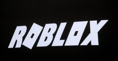 The Roblox logo is displayed on a banner, in New York, U.S., March 10, 2021. (Reuters Photo)