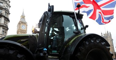 A tractor drives near the Elizabeth Tower, also known as Big Ben, during a demonstration, protesting against the Labour government's new agricultural policy, which includes a budget measure expected to increase inheritance tax liabilities for some farmers, in London, Britain, Nov. 19, 2024. (Reuters Photo)