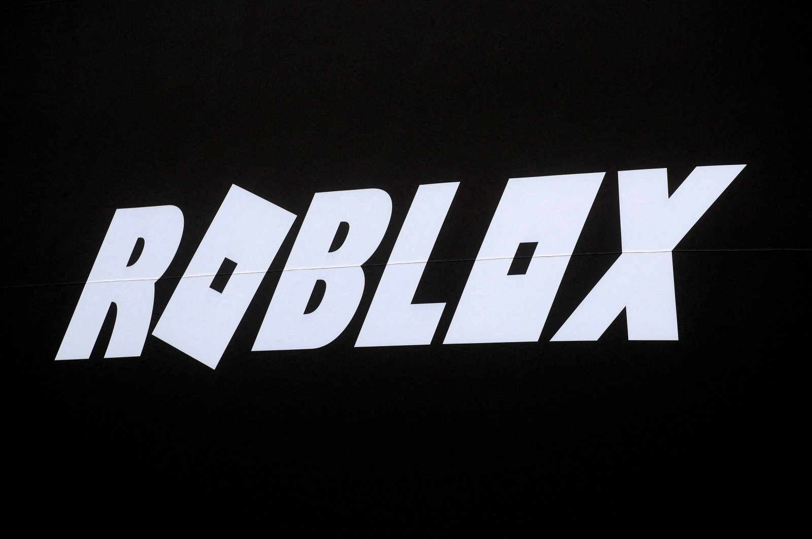 The Roblox logo is displayed on a banner, in New York, U.S., March 10, 2021. (Reuters Photo)