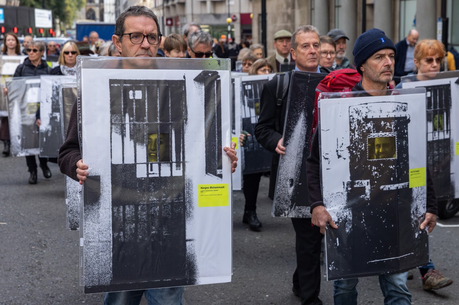 Supporters of the Free Political Prisoners campaign arrive to stage a public protest exhibition of images of past and present political prisoners in the road outside the Attorney General&#039;s office and Ministry of Justice on United Nations Day, London, U.K., Oct. 24, 2024. (Getty Images Photo)