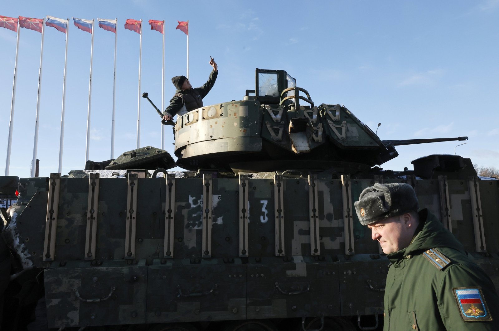 People view a U.S.-manufactured M2 Bradley fighting vehicle during the opening of an exhibition featuring military equipment seized in Ukraine by Russian forces, in St. Petersburg, Russia, Nov. 4, 2024. (EPA File Photo)