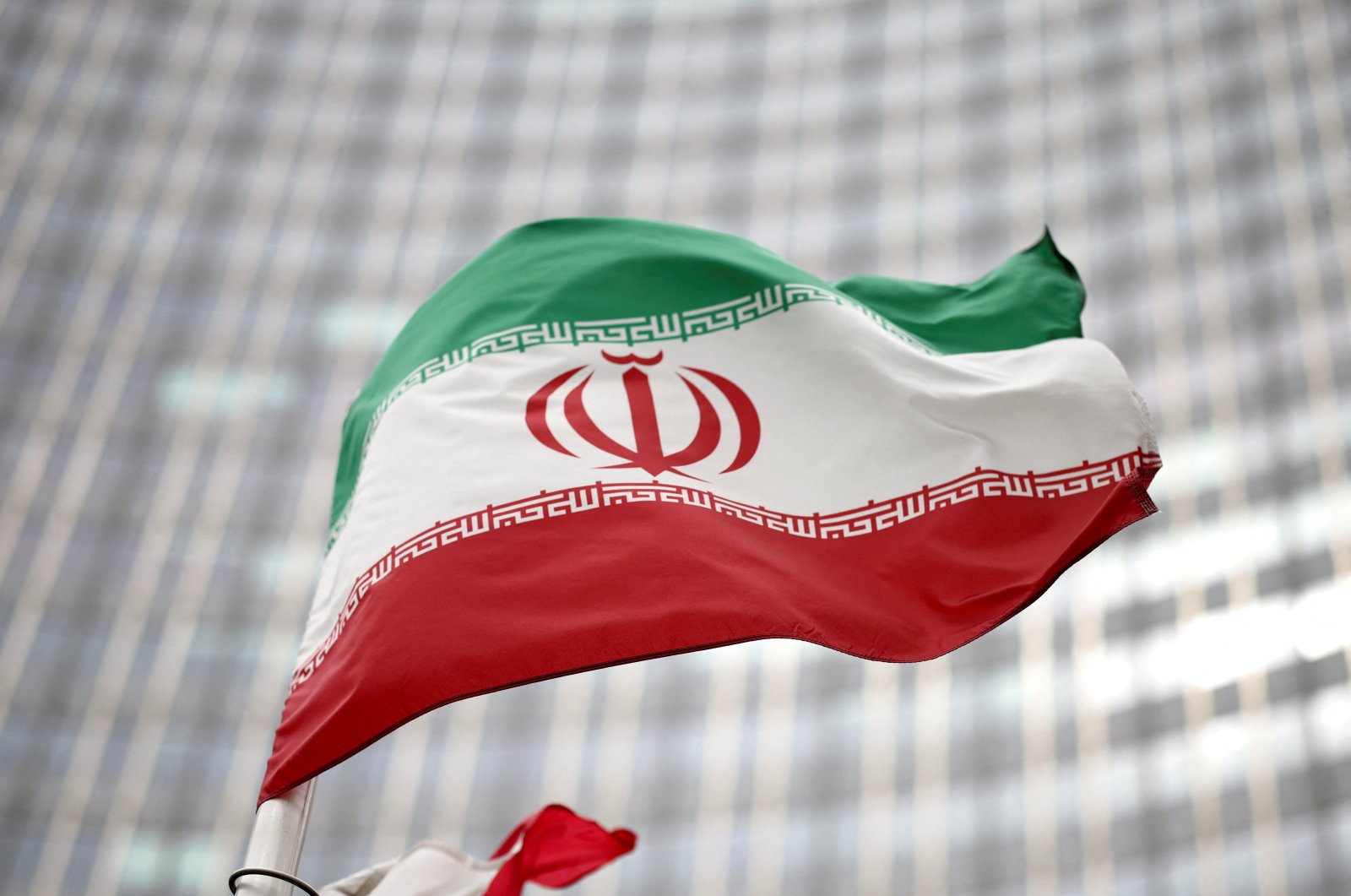 Iranian flag flies in front of the U.N. office building, housing IAEA headquarters, amid the COVID-19 pandemic, in Vienna, Austria, May 24, 2021. (Reuters File Photo)