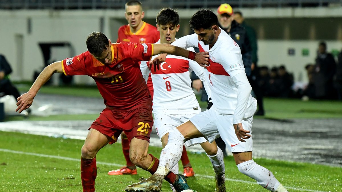 Montenegro&#039;s midfielder Ognjen Gasevic (L) fights for the ball with Türkiye&#039;s midfielder Arda Güler (C) and defender Samet Akaydın during the UEFA Nations League League B Group 4 match at the City Stadium, Niksic, Montenegro, Nov. 19, 2024. (AFP Photo)