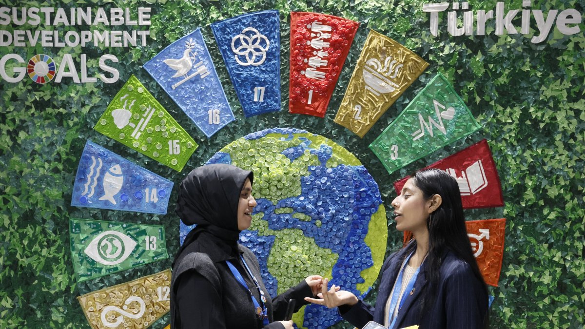 Participants stand near the Türkiye pavilion during the United Nations Climate Change Conference COP29, Baku, Azerbaijan, Nov. 14, 2024. (EPA Photo)