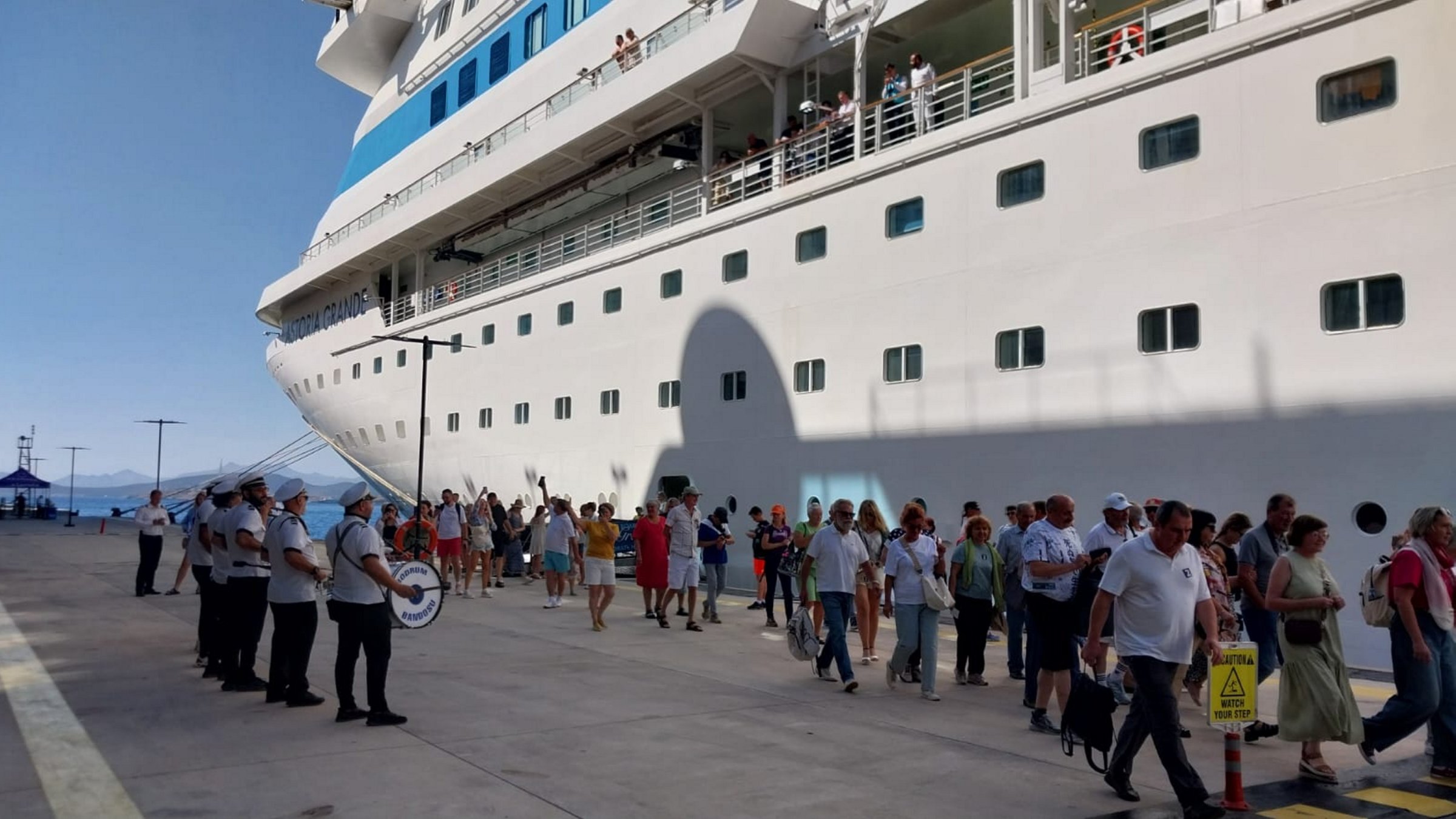 Passengers are seen close to a ship docked in the port of Bodrum, southwestern Türkiye, Nov. 10, 2024. (AA Photo)