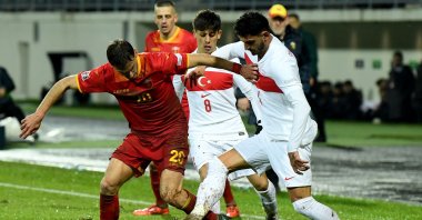 Montenegro&#039;s midfielder Ognjen Gasevic (L) fights for the ball with Türkiye&#039;s midfielder Arda Güler (C) and defender Samet Akaydın during the UEFA Nations League League B Group 4 match at the City Stadium, Niksic, Montenegro, Nov. 19, 2024. (AFP Photo)