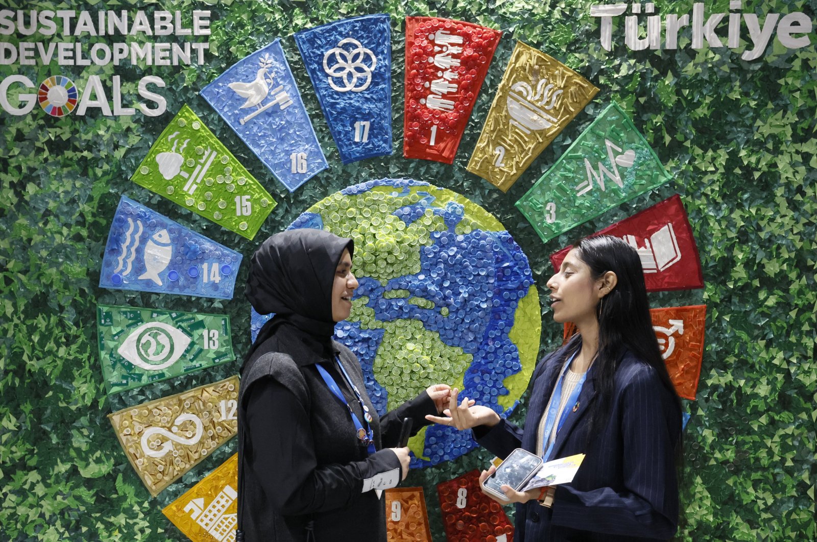 Participants stand near the Türkiye pavilion during the United Nations Climate Change Conference COP29, Baku, Azerbaijan, Nov. 14, 2024. (EPA Photo)