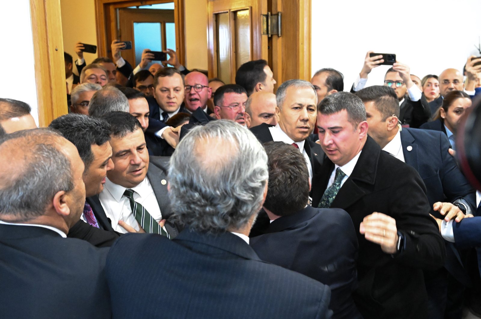 CHP lawmakers try to stop Interior Minister Ali Yerlikaya at Parliament, Ankara, Türkiye, Nov. 20, 2024. (AA Photo)