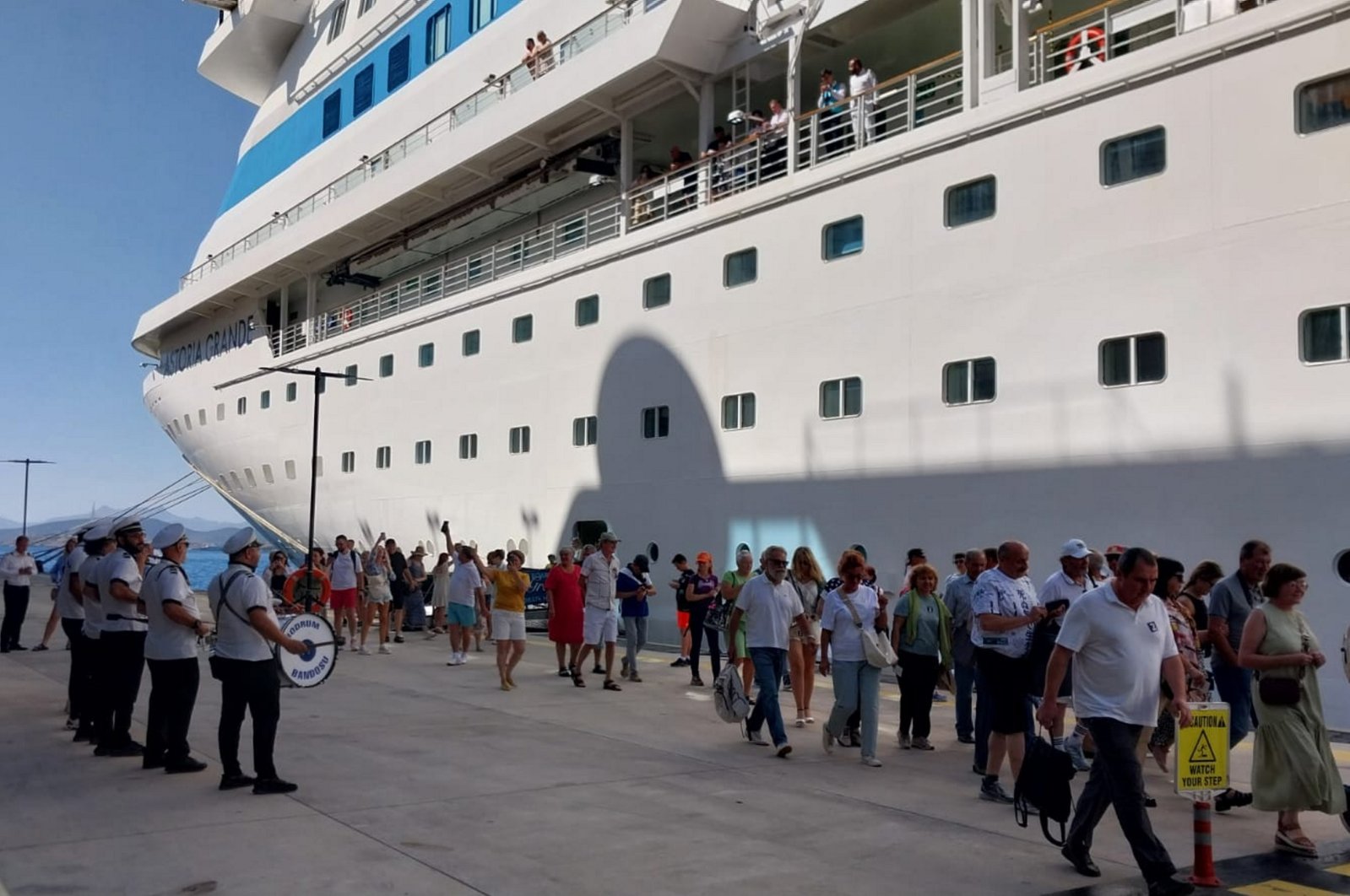 Passengers are seen close to a ship docked in the port of Bodrum, southwestern Türkiye, Nov. 10, 2024. (AA Photo)