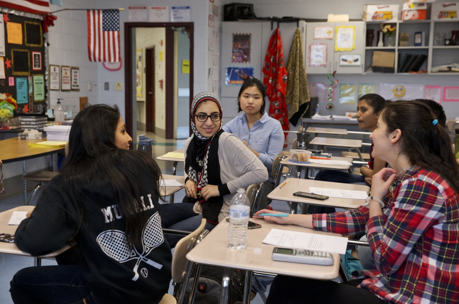 In this file photo, students chat in class before an after-hours study session for their math final at Northwest High School in Germantown, Maryland, U.S., May 10, 2016. (AP File Photo)