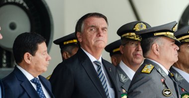 Brazil's then-President Jair Bolsonaro (C) attends a graduation ceremony for cadets at the Agulhas Negras Military Academy in Resende, Rio de Janeiro State, Brazil, Nov. 26, 2022. (AFP File Photo)