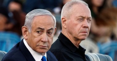 Israeli Prime Minister Benjamin Netanyahu and Israeli Defense Minister Yoav Gallant attend a ceremony for the 70th cohort of military combat officers, at an army base near Mitzpe Ramon, Israel, Oct. 31, 2024. (Reuters Photo)