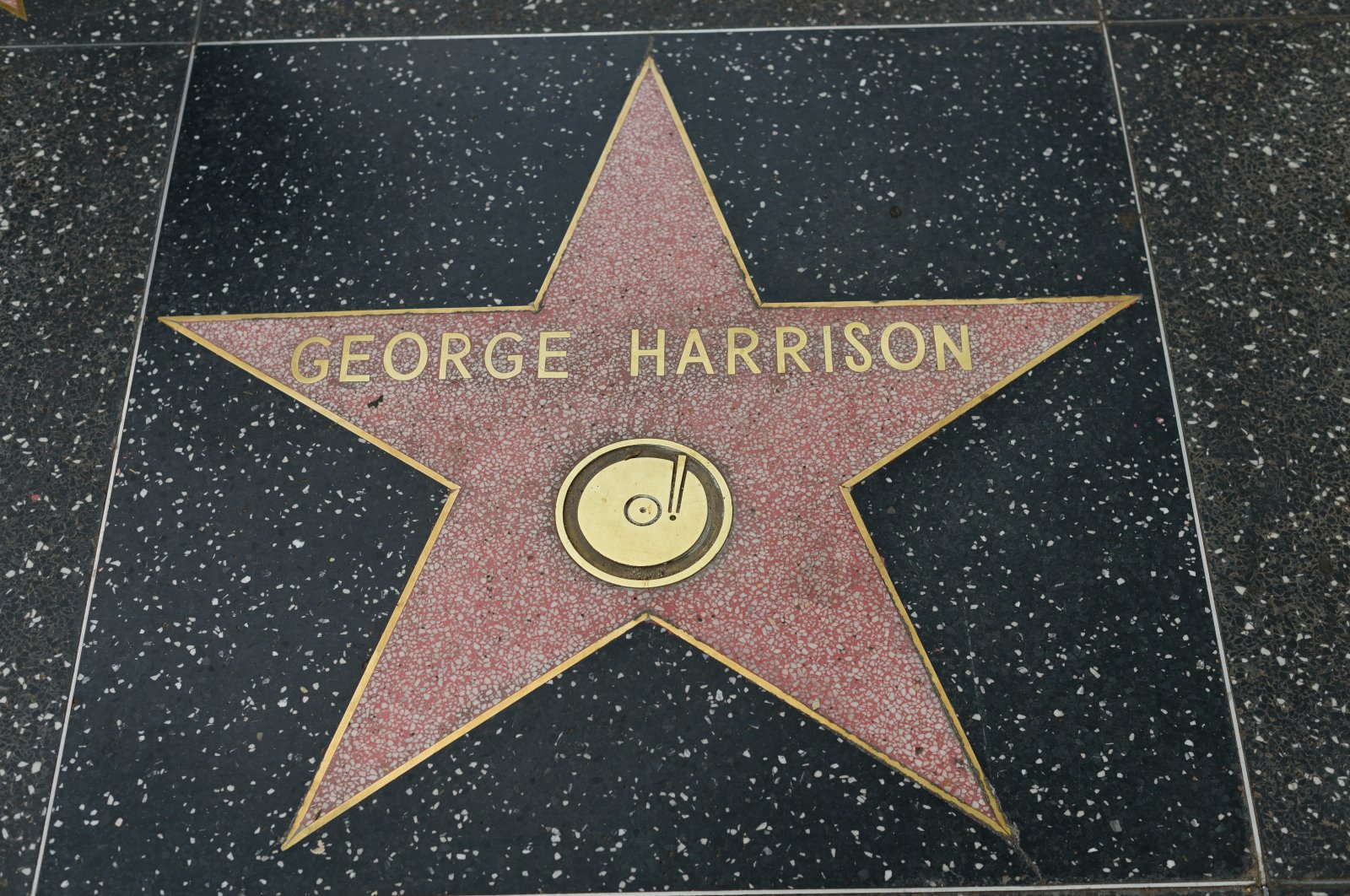 George Harrison&#039;s star on the Hollywood Walk of Fame in Hollywood, California, U.S., Dec. 6, 2016. (Shutterstock)