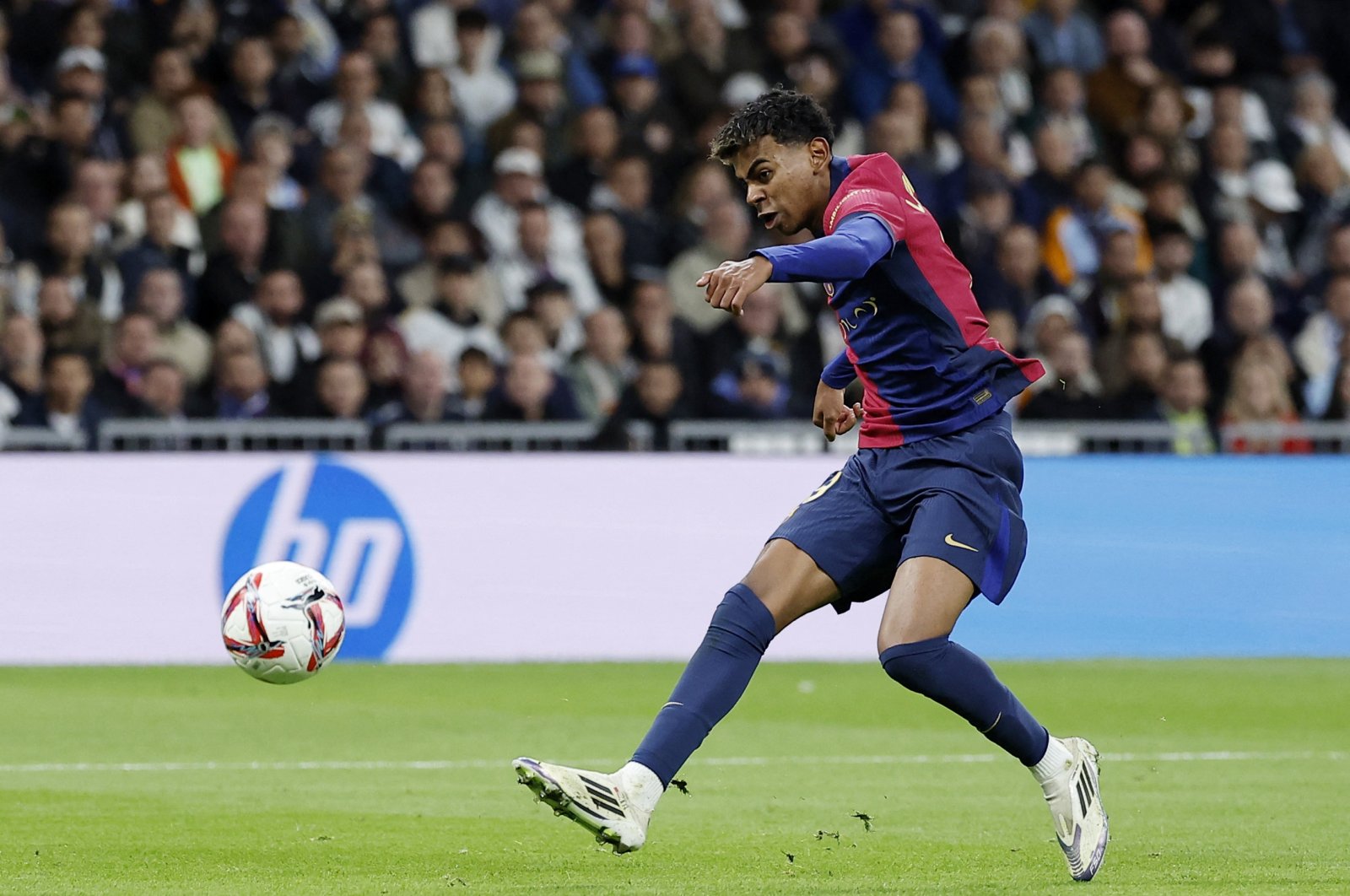 Barcelona&#039;s Lamine Yamal scores their third goal during the LaLiga match against Real Madrid at the Santiago Bernabeu, Madrid, Spain, Oct. 26, 2024. (Reuters Photo)