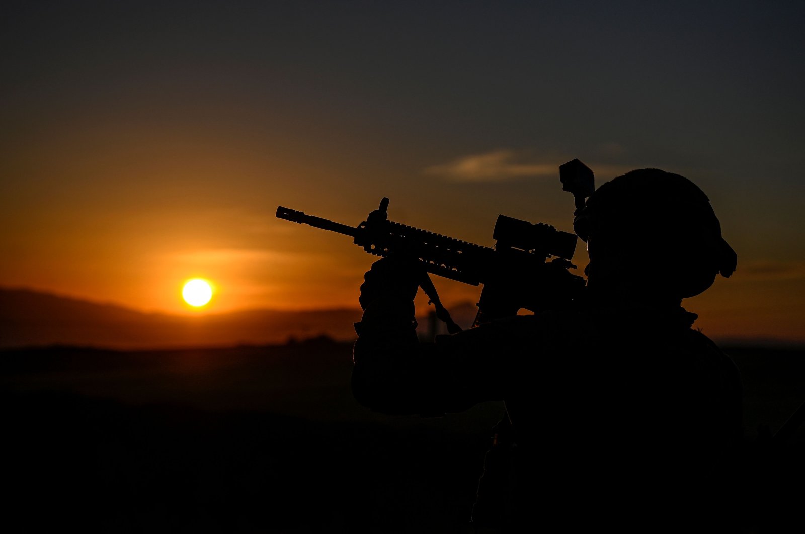 A Turkish soldier patrols near the border wall between Türkiye and Iran, Van, eastern Türkiye, Nov. 1, 2024. (AFP Photo)