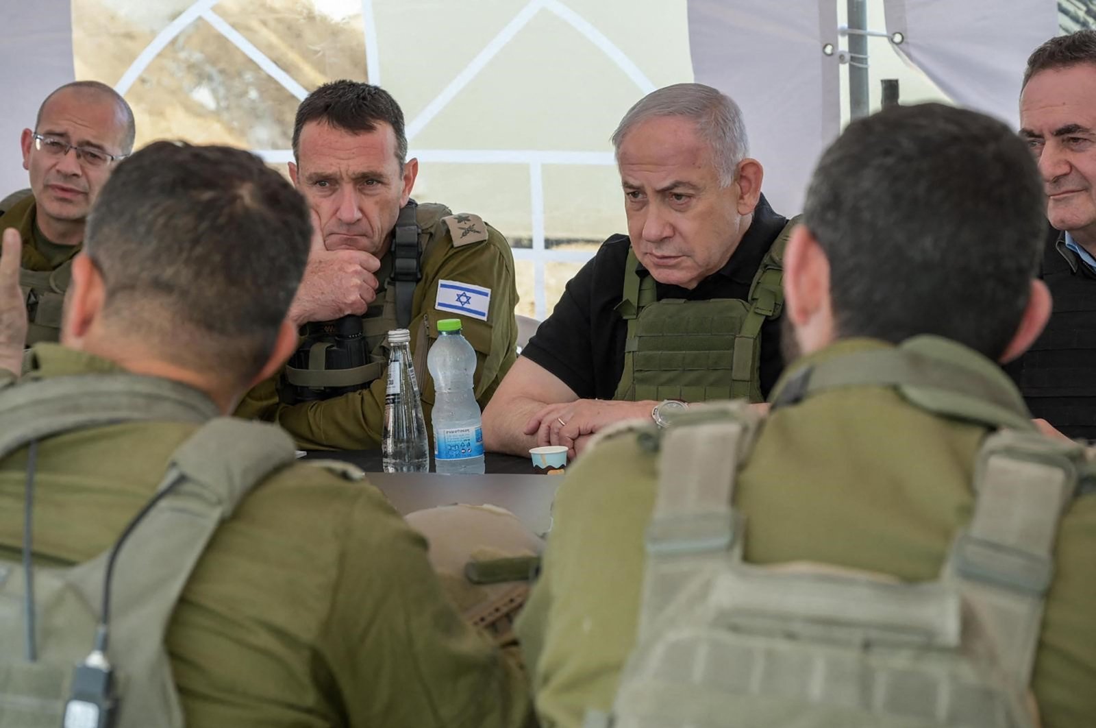 This handout picture released by the Government Press Office (GPO) shows Israel&#039;s Prime Minister Benjamin Netanyahu (R), Defense Minister Israel Katz (R) and army Chief-of-Staff Herzi Halevi (2nd L) during a briefing in the Netzarim Corridor just south of Gaza City, Nov. 19, 2024. (AFP Photo)