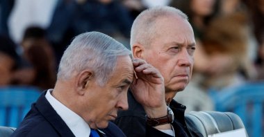 Israeli Prime Minister Benjamin Netanyahu (L) and former Israeli Defense Minister Yoav Gallant attend a ceremony for the 70th cohort of military combat officers, at an army base near Mitzpe Ramon, Israel, Oct. 31, 2024. (Reuters Photo)