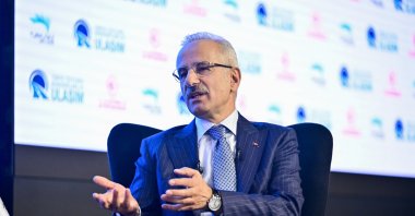Transport and Infrastructure Minister Abdulkadir Uraloğlu speaks during the "Sustainable Transport in the Century of Türkiye Summit," organized by Turkuvaz Media Group, in Istanbul, Türkiye, Nov. 22, 2024. (AA Photo)