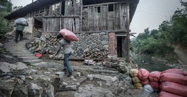 Changshun oil mill, located in Sanxi township, Minqing County in East China&#039;s Fujian province, known as the &quot;hometown of camellia oil,&quot; has a history of about 100 years of making tea oil from camellias seeds, Jan. 17, 2016. (Reuters File Photo)