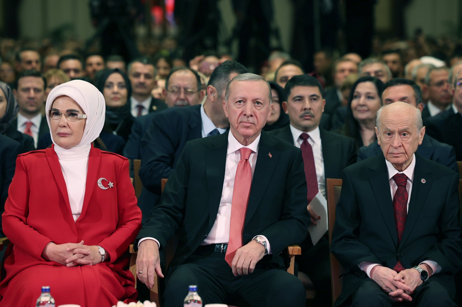 First lady Emine Erdoğan (L), President Recep Tayyip Erdoğan (C) and Nationalist Movement Party (MHP) Chair Devlet Bahçeli participate in a meeting organized to celebrate the Republic of Türkiye&#039;s founding anniversary, Ankara, Türkiye, Oct. 29, 2024. (AA Photo)