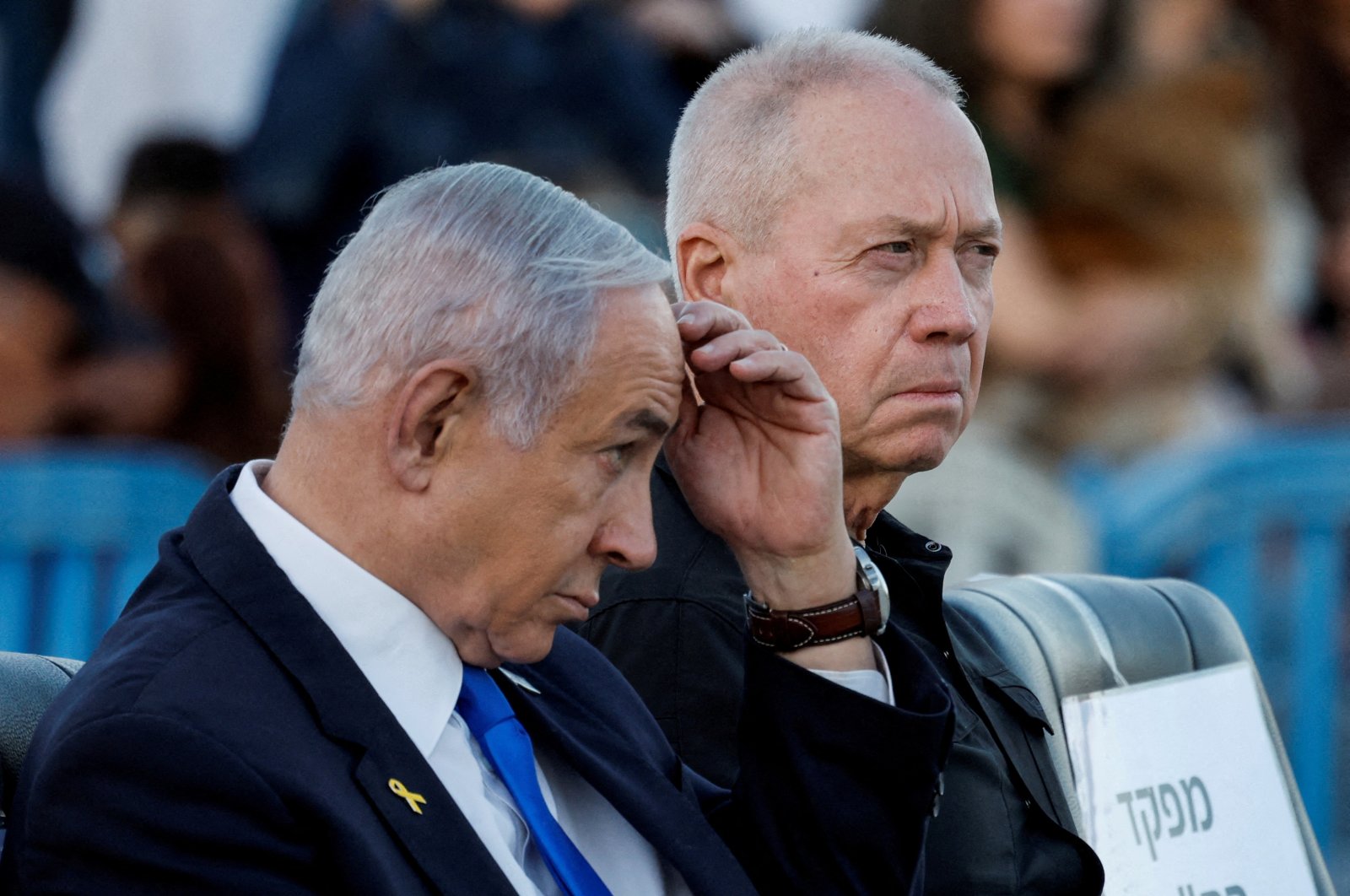 Israeli Prime Minister Benjamin Netanyahu (L) and former Israeli Defense Minister Yoav Gallant attend a ceremony for the 70th cohort of military combat officers, at an army base near Mitzpe Ramon, Israel, Oct. 31, 2024. (Reuters Photo)