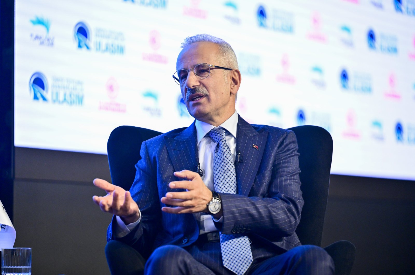 Transport and Infrastructure Minister Abdulkadir Uraloğlu speaks during the "Sustainable Transport in the Century of Türkiye Summit," organized by Turkuvaz Media Group, in Istanbul, Türkiye, Nov. 22, 2024. (AA Photo)