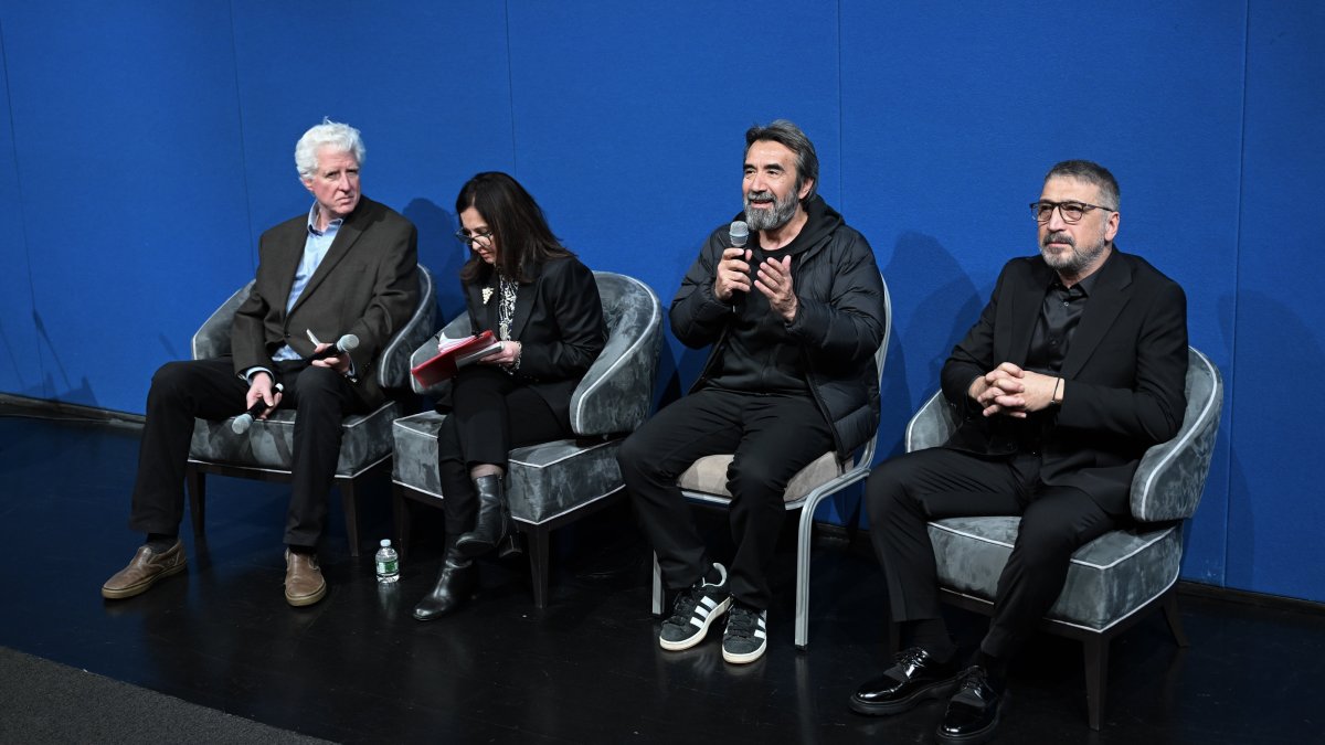 Film director Zeki Demirkubuz (2nd R) speaks at an event to premier his Oscar entry &quot;Life,&quot; at Turkish House (Türkevi), New York, U.S., Nov. 22, 2024. (AA Photo)