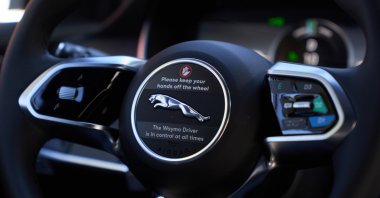 A Waymo autonomous self-driving Jaguar robotaxi drives down the road in Los Angeles, California, U.S., Nov. 20, 2024. (EPA Photo)