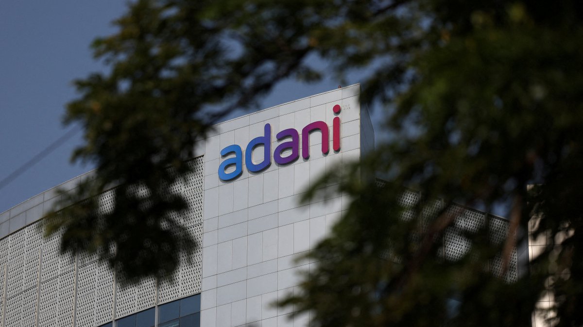 The logo of the Adani Group is seen on the facade of its Corporate House on the outskirts of Ahmedabad, India, Nov. 21, 2024. (Reuters Photo)