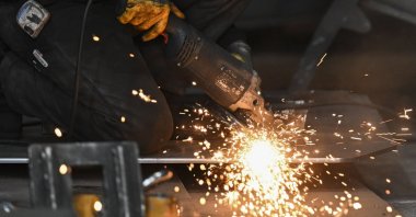 A worker is photographed at a factory in Ankara, Türkiye, Nov. 21, 2024. (AA Photo)
