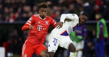 Bayern Munich&#039;s Kingsley Coman (L) battles for possession with PSG&#039;s Nuno Mendes during the UEFA Champions League round of 16 leg two match at Allianz Arena, Munich, Germany, March 8, 2023. (Getty Images Photo)