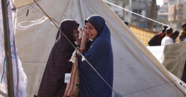 Women react after a tent that was sheltering displaced Palestinians was hit in an Israeli strike, Deir el-Balah, the Gaza Strip, Palestine, Nov. 21, 2024. (AFP Photo)