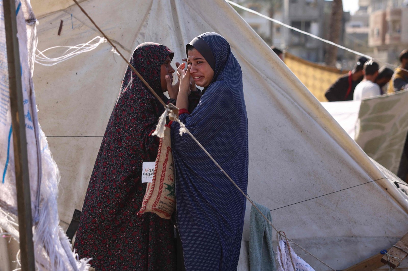 Women react after a tent that was sheltering displaced Palestinians was hit in an Israeli strike, Deir el-Balah, the Gaza Strip, Palestine, Nov. 21, 2024. (AFP Photo)