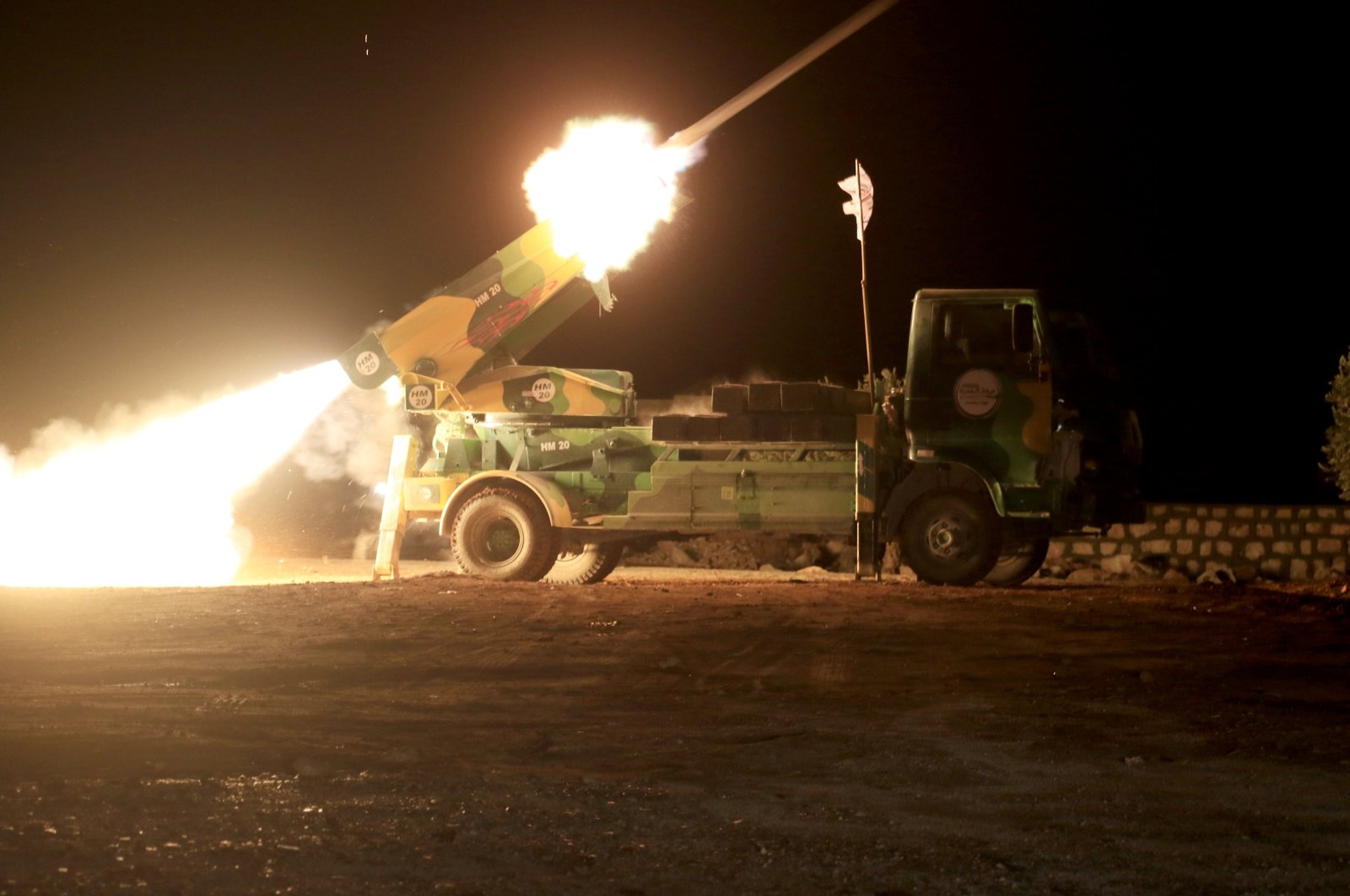 Syrian opposition forces fire rockets at PKK/YPG positions in al-Bab, Syria, Nov. 24, 2024. (AA Photo)