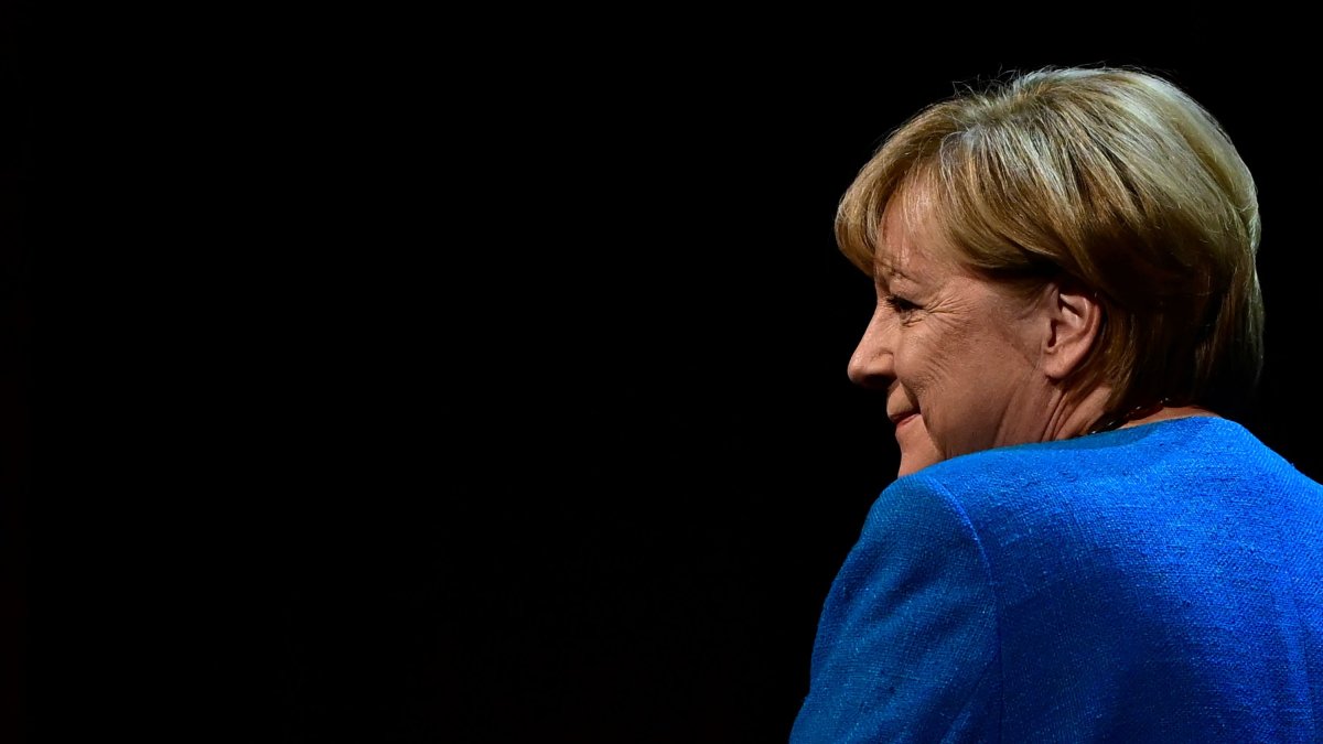 Former German chancellor Angela Merkel arrives on stage for her first public interview since stepping down, at the Berliner Ensemble Theatre, Berlin, Germany, June 7, 2022. (AFP File Photo)