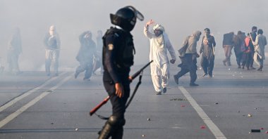 Policemen fire tear gas shells to disperse supporters of the Pakistan Tehreek-e-Insaf (PTI) party during a protest to demand the release of former prime minister Imran Khan, in Islamabad, Pakistan, Nov. 26, 2024. (AFP Photo)
