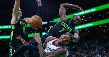 Boston Celtics guard Jaylen Brown (R) fouls LA Clippers guard Kevin Porter Jr. (C) in the second half at TD Garden, Boston, Massachusetts, U.S., Nov. 25, 2024. (Reuters Photo)
