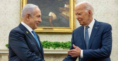 U.S. President Joe Biden (R) shakes hands with Israeli Prime Minister Benjamin Netanyahu during a meeting in the Oval Office of the White House in Washington, D.C. July 25, 2024. (AFP Photo)