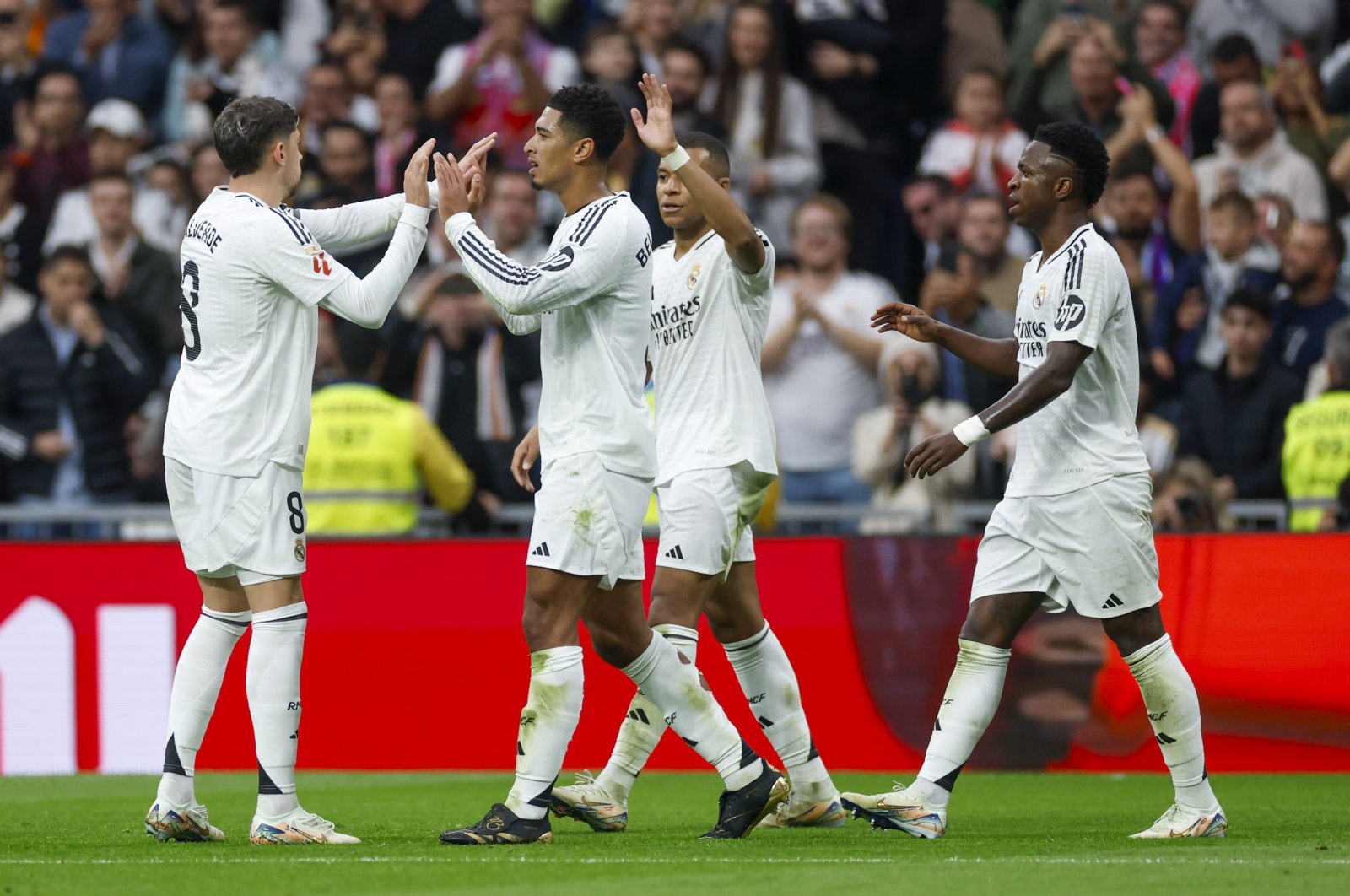 Real Madrid&#039;s midfielder Jude Bellingham (2nd L) celebrates a goal with teammates during the Spanish La Liga match between Real Madrid and Osasuna at Santiago Bernabeu Stadium, Madrid, Spain, Nov. 9, 2024. (EPA Photo)