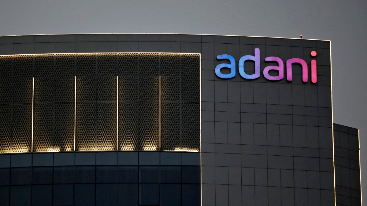 The logo of the Adani Group is seen on the facade of one of its buildings on the outskirts of Ahmedabad, India, April 13, 2021. (Reuters Photo)
