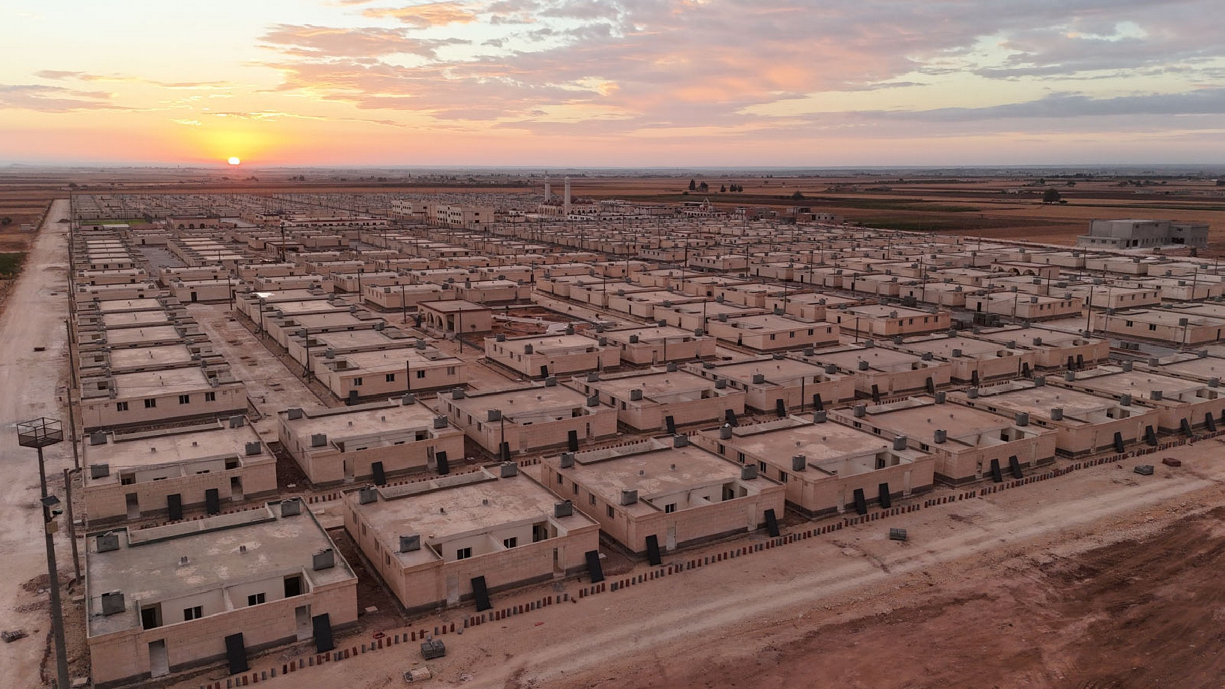 An aerial view shows the buildings established as part of the &quot;Hope City&quot; project, Tukli village near Azaz, northern Syria, Nov. 27, 2024. (AA Photo)