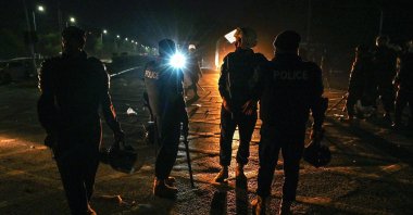 Policemen stand guard at the Red Zone area after an overnight operation against the supporters of jailed ex-PM Imran Khan, Islamabad, Pakistan, Nov. 27, 2024. (AFP Photo)