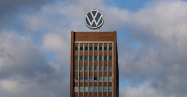 The logo of the German automotive company Volkswagen is displayed on the rooftop of the company&#039;s factory in Wolfsburg, Germany, Nov. 21, 2024. (EPA Photo)