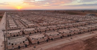 An aerial view shows the buildings established as part of the "Hope City" project, Tukli village near Azaz, northern Syria, Nov. 27, 2024. (AA Photo)